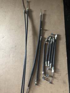 Trunk release cable for moped scooter