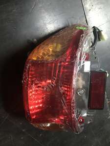 Light back stop for the scooter assy