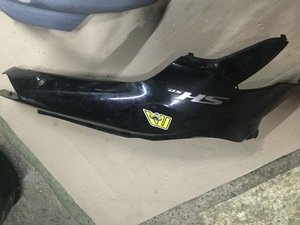Пластик основной боковой под сидения Honda SH левый