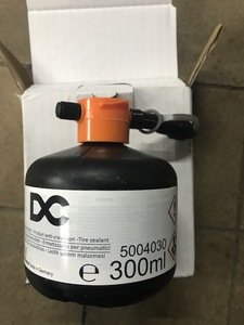 Filling fluid tire sealant bottle Smart 453