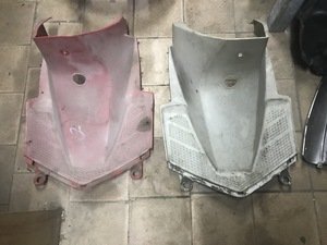Newspaper holder for Honda DJ scooter