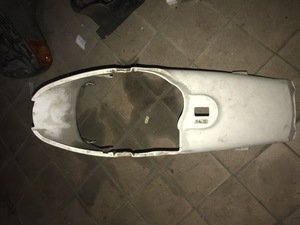 Пластик под сидения боковой для скутера Honda Protopic