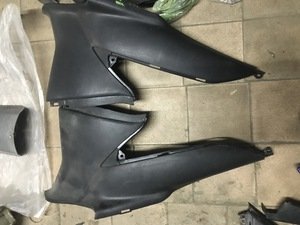 Пластик боковой нижний Suzuki